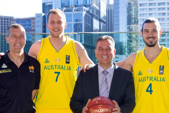 Former minister for fun: Andrews government MP John Eren with Boomers coach Andrej Lemanis, Joe Ingles and Chris Goulding