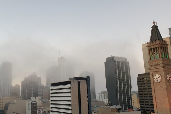 Heavy fog has hit Brisbane’s CBD as temperatures are expected to drop. 