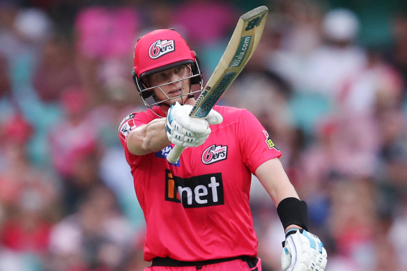 Steve Smith brings up his half-century for the Sydney Sixers at the SCG on Saturday.
