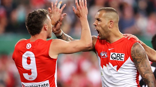 Lance Franklin celebrates kicking a goal against Collingwood.