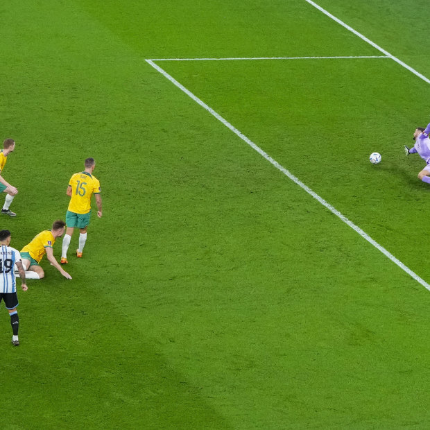 Lionel Messi shoots past Mat Ryan.