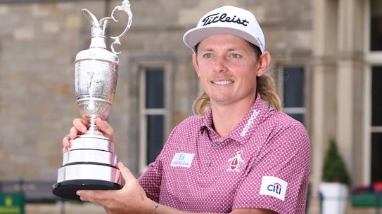 Cameron Smith poses with the famous claret jug after his victory at St Andrews.