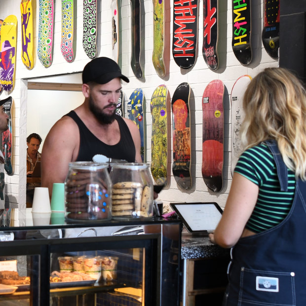 Customers wait in line at Livid Skate Café in Scarborough. 