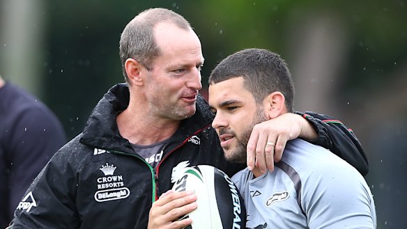 Talking shop: Michael Maguire and Adam Reynolds at Redfern Oval in 2014.