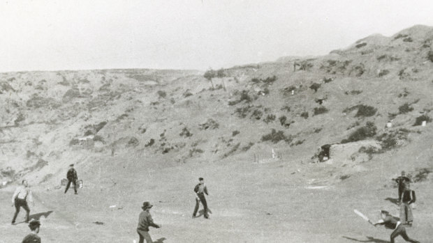 Australian troops play cricket so as to alleviate suspicion from the Turks that forces were being evacuated.