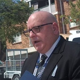 Detective Superintendent Andrew Massingham speaking about the alleged murder at a Yeronga unit.