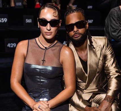 Alyssa and Patty Mills take their front-row seats at Dolce & Gabbana’s Milan fashion show this week.