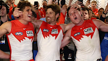 Swans players sing the song after knocking off Brisbane.