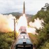 North Korea tests new railway-borne missile to strike ‘threatening forces’