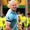 Manchester City’s Erling Haaland celebrates scoring his side’s third goal against Wolves. 
