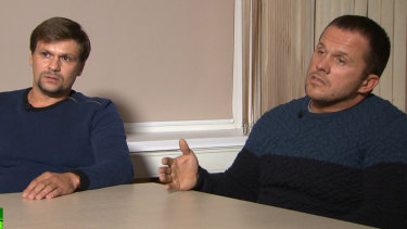 In this video grab provided by the RT channel, Ruslan Boshirov, left, believed to be Colonel Anatoliy Vladimirovich Chepiga, and Alexander Petrov attend their first public appearance in an interview with the Kremlin-funded RT channel in Moscow, Russia.