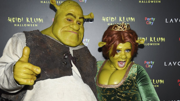 Heidi Klum, right, and Tom Kaulitz as Fiona and Shrek.