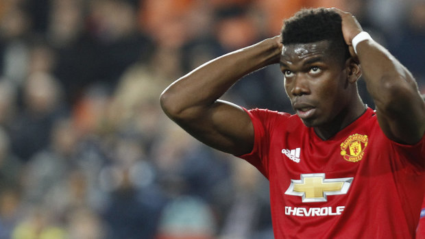 Manchester United's Paul Pogba reacts after missing a chance against Valencia.