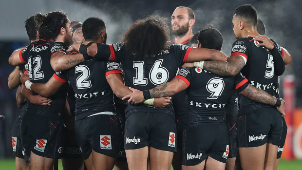 Taking charge: Simon Mannering leads the Warriors team talk in his 300th NRL match.