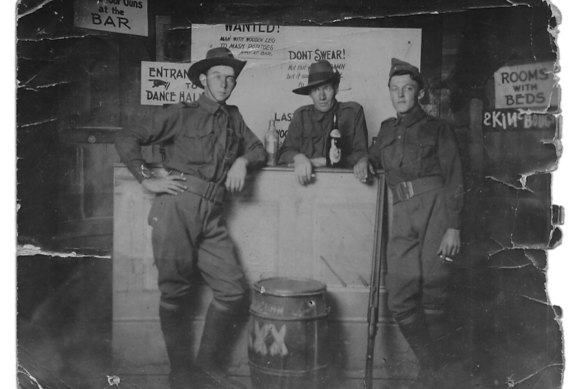 Jack Hayes, far right, having a drink with mates on August 31, 1914. 