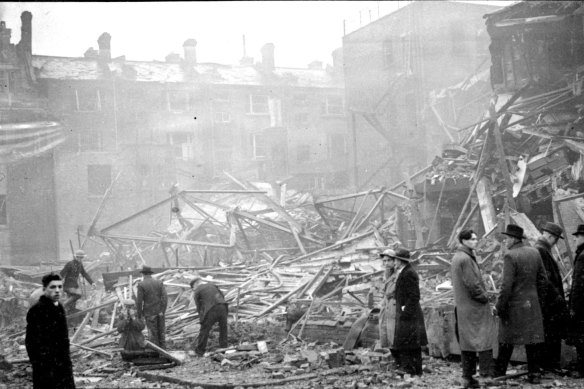 Rescue workers clear rubble after a London department store was hit by German bombs. Francis Spufford’s novel begins with just such a raid cutting short the lives of his five main characters.