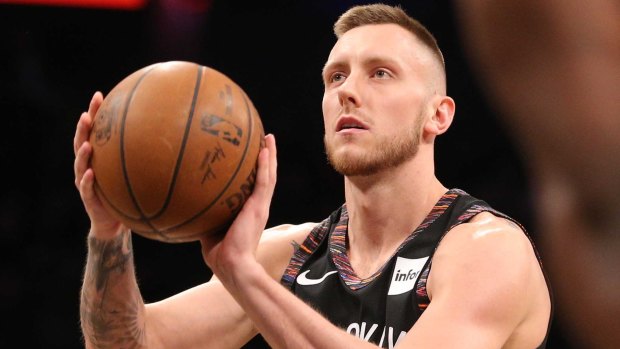 Dream come true: Australia's Mitch Creek takes his free throw shot during two seconds of play for the Brooklyn Nets. 
