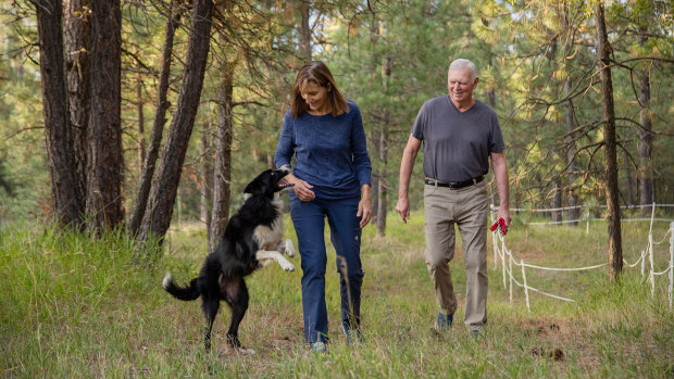 Carole and Verne King with their border collie, Katie, at their home in Deer Park, Washington. 