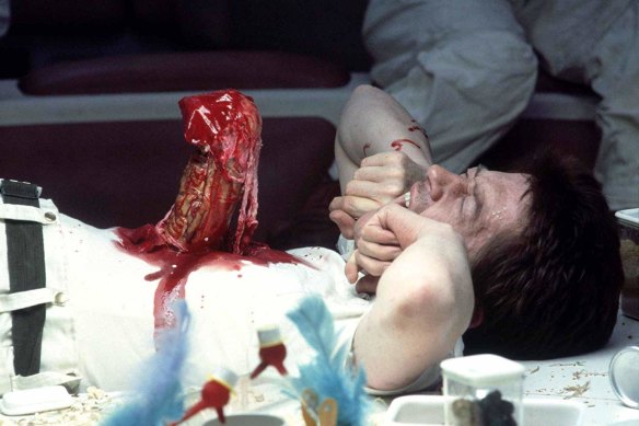  John Hurt in the original Alien film’s most iconic - and grotesque - scene. 