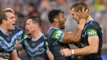 Dynamic duo: Josh Addo Carr and Trbojevic celebrate.