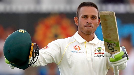 Breakthrough: Usman Khawaja celebrates after reaching his century.