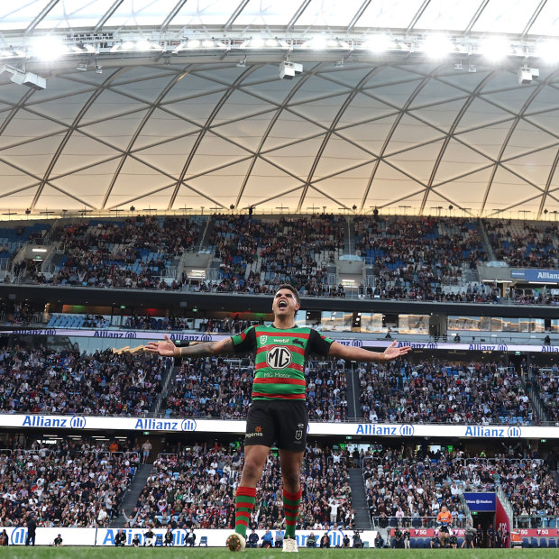 Box office: Latrell Mitchell roars to the crowd after nailing a sideline conversion against the Roosters.