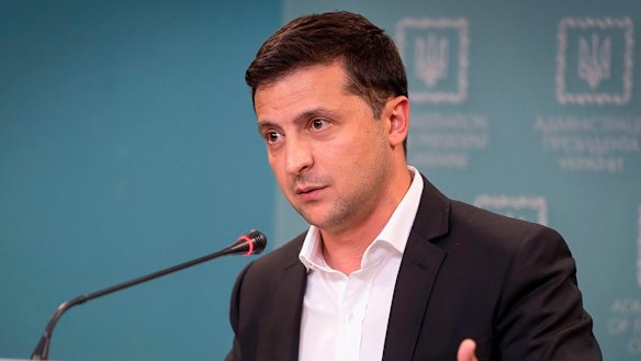 Ukrainian President Volodymyr Zelenskiy speaks to media during his press conference in Kyiv, Ukraine.