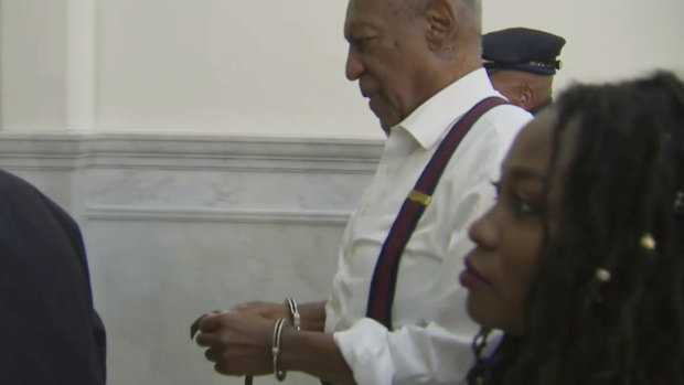 Bill Cosby is led away in handcuffs after he was sentenced.