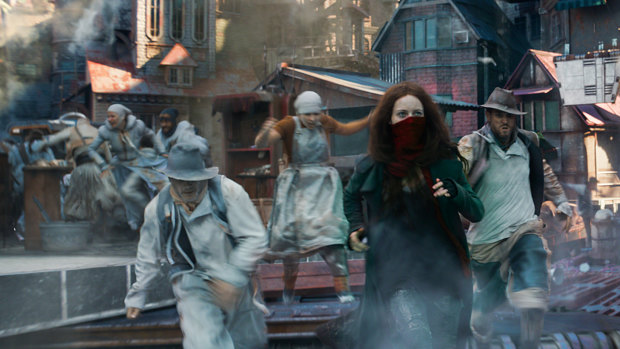 Trying to escape futuristic London on wheels: Hera Hilmar (in mask) as Hester in Mortal Engines.