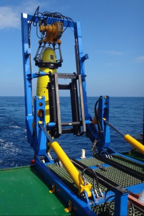 REMUS 6000 being deployed off the Colombian Navy research ship ARC Malpelo.