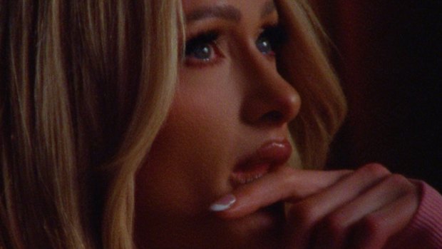 Paris Hilton gets emotional during a scene from the documentary.