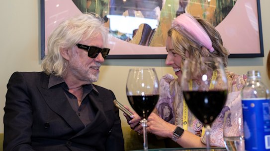 Sir Bob Geldof chats with Age journalist Cara Waters at the Melbourne Cup.