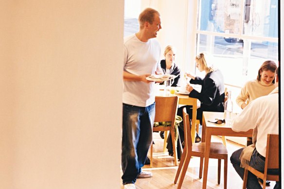 Bill Granger on the floor at bills in Darlinghurst in 2002.