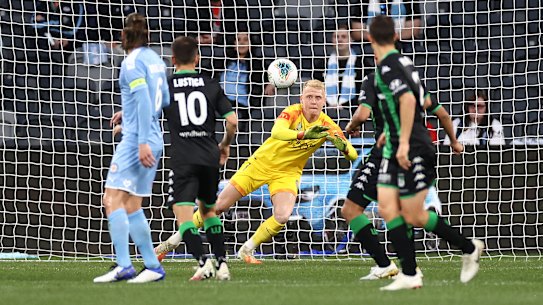 Tom Glover makes a save in the semi-final win over Western United.