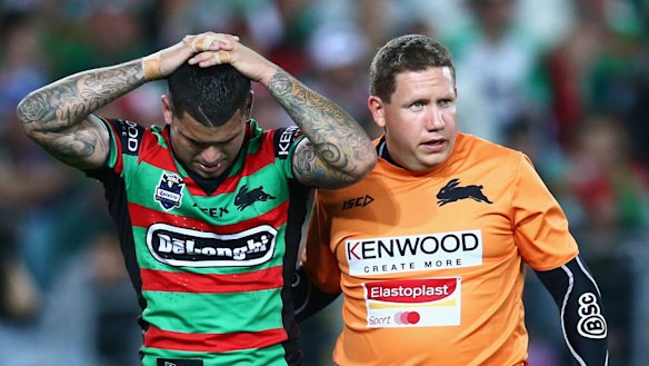 Adam Reynolds leaves the field with a hamstring injury in his first preliminary final in 2012.