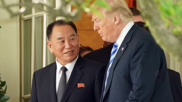 US President Donald Trump with North Korea's envoy, former military intelligence chief Kim Yong Chol. 