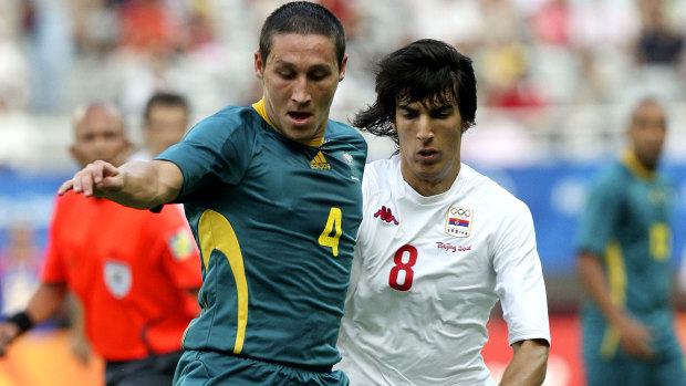 A youthful Mark Milligan (left) at the 2008 Olympics.