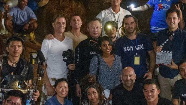 Some of the cast and crew of The Cave, directed by Tom Waller and which will debut on October 5, inside the mouth of Tham Luang cave.  