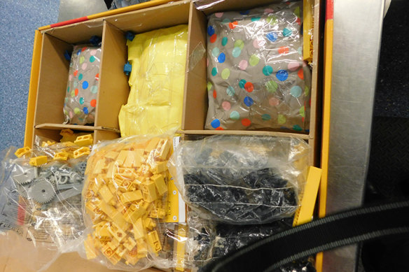 There are fears overworked airport staff will struggle to detect unlawful imports, such as this interception at Sydney airport in November. 
 It involved methamphetamine concealed in boxes of toys.