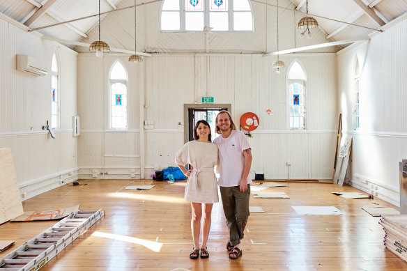 Matilda Riek and Brad Cooper inside the 19th-century church that will become August in November.