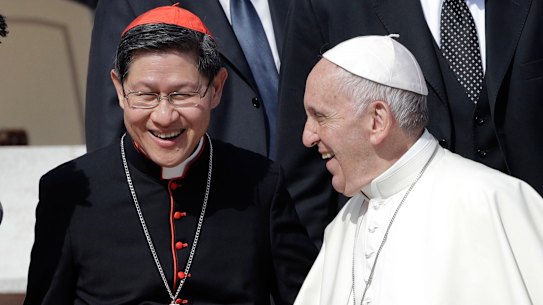 Pope Francis (right) with Cardinal Luis Antonio Tagle in 2017.