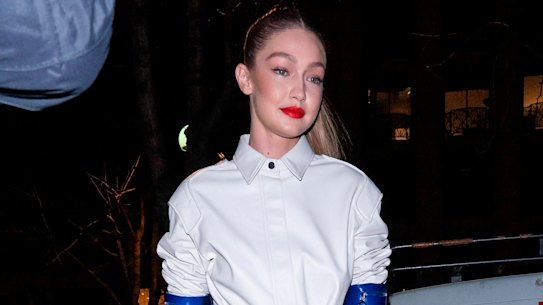 Gigi Hadid gives her boilersuit a moto-racing edge.
