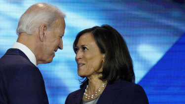 Joe Biden and Kamala Harris shake hands after a Democratic presidential primary debate in September last year.