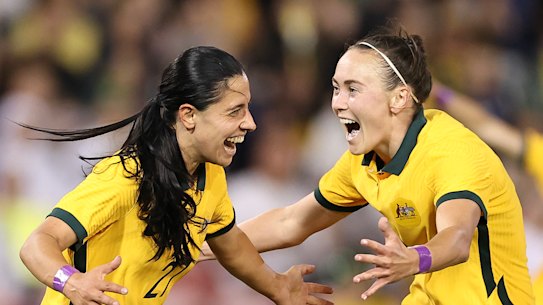 Alex Chidiac celebrates a goal with Caitlin Foord during the Matildas’ Cup of Nations win over Jamaica.