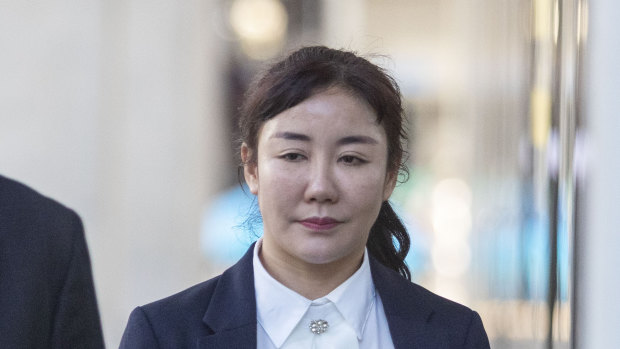 Yutian Li leaves the Brisbane District Court on Monday.