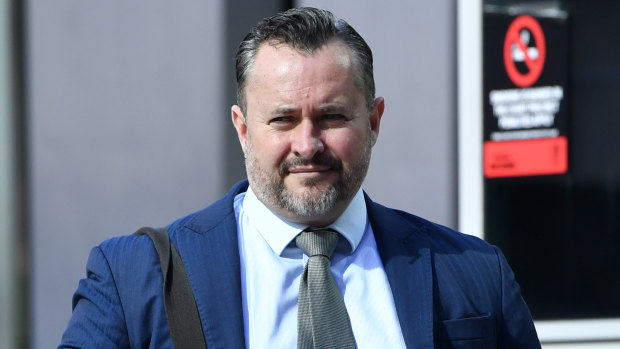 Lawyer Adam Magill is seen arriving at the Brisbane Magistrates Court on Thursday.