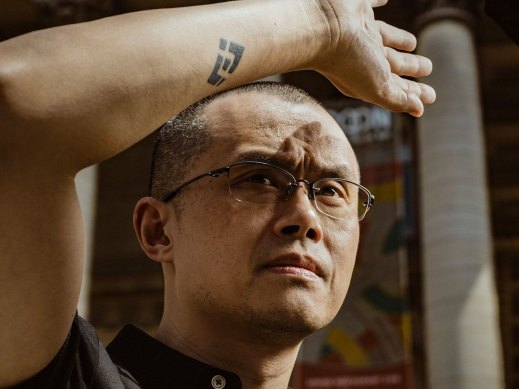Changpeng Zhao with his Binance tattoo in Paris.