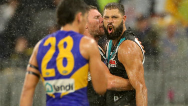 Paddy Ryder puts another goal through for Port Adelaide.