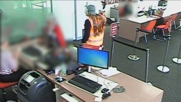 Masked thieves storm a Bendigo Bank branch in Laverton.