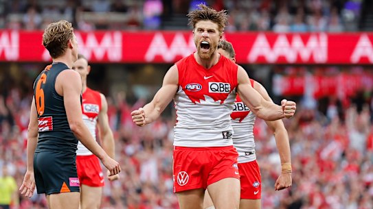 Dane Rampe of the Swans celebrates a goal during the Qualifying Final against the Giants